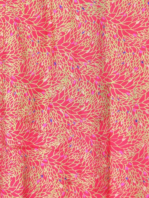 Jupe longue en soie rose aux détails floraux